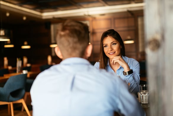 two-business-people-having-an-informal-meeting-in-a-cafe